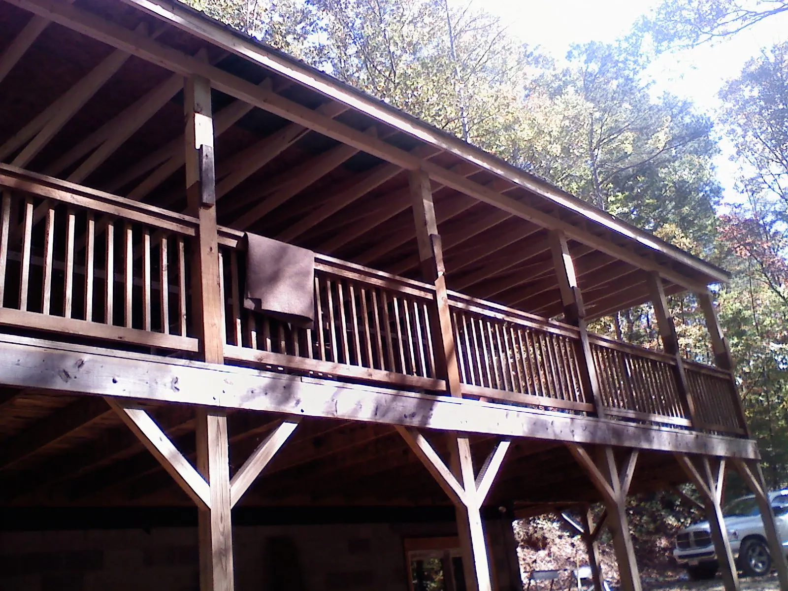 Timber framing under a new elevated porch and deck — Roof Leak Repair in Holley by Roofing Brothers